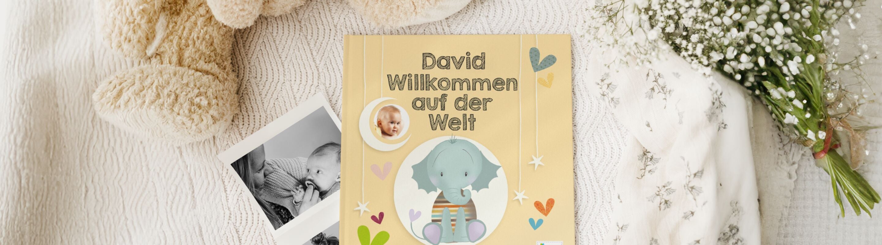 Personalisiertes Babybuch mit Namen David und Foto auf dem Cover, dekoriert mit niedlichen Elefanten-Illustrationen und bunten Herzen, ideal als individuelles Geschenk.