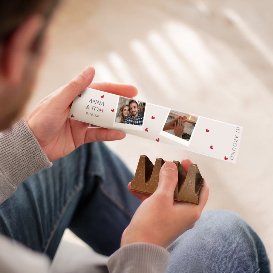 Personalizovaná Toblerone Personalizovaná Toblerone čokoláda s potlačenými fotografiami, menami Anna & Tom a dátumom 12.08.2012 na obale.