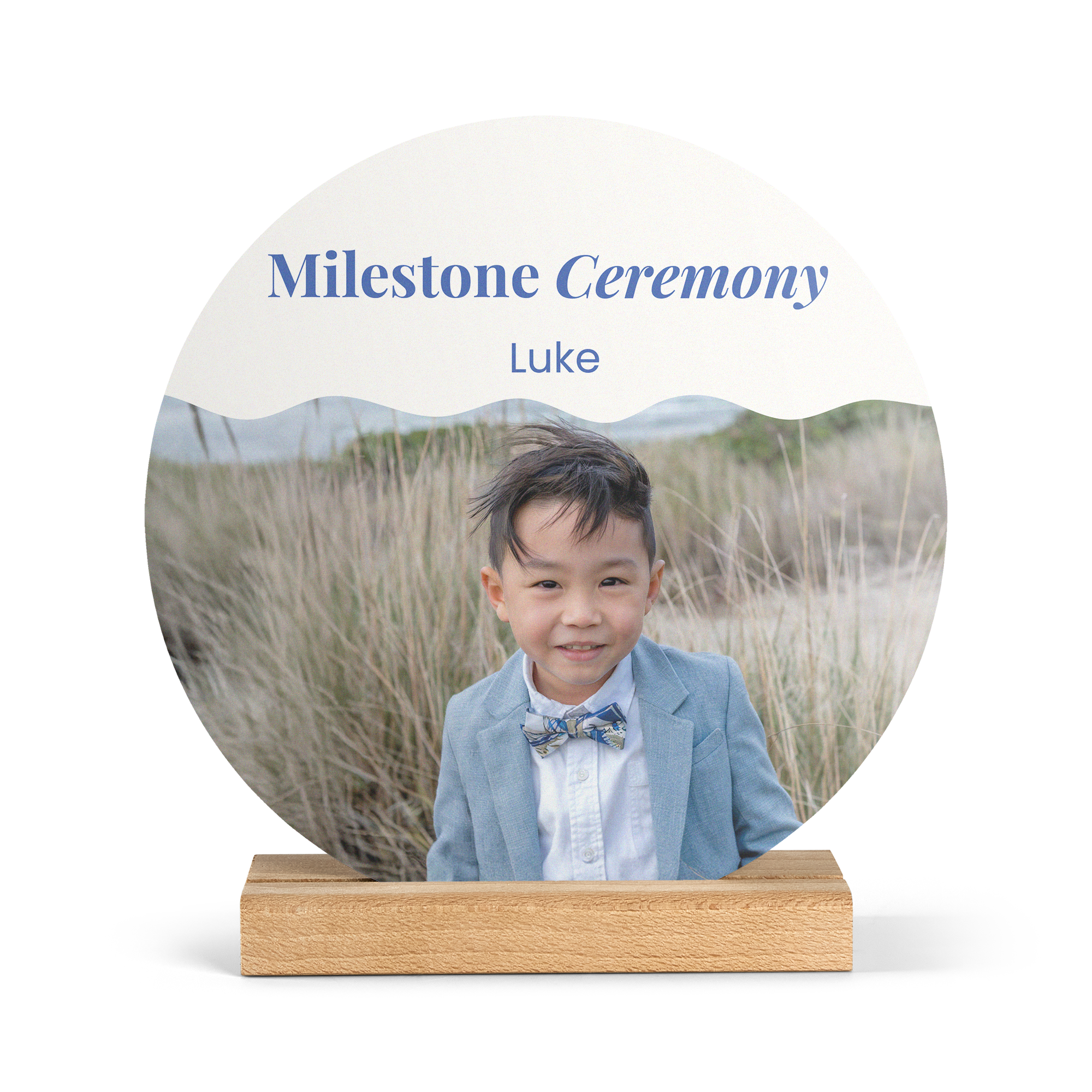 Personalized round wooden photo tile printed with a boy's photo and the text Milestone Ceremony Luke for a stunning display