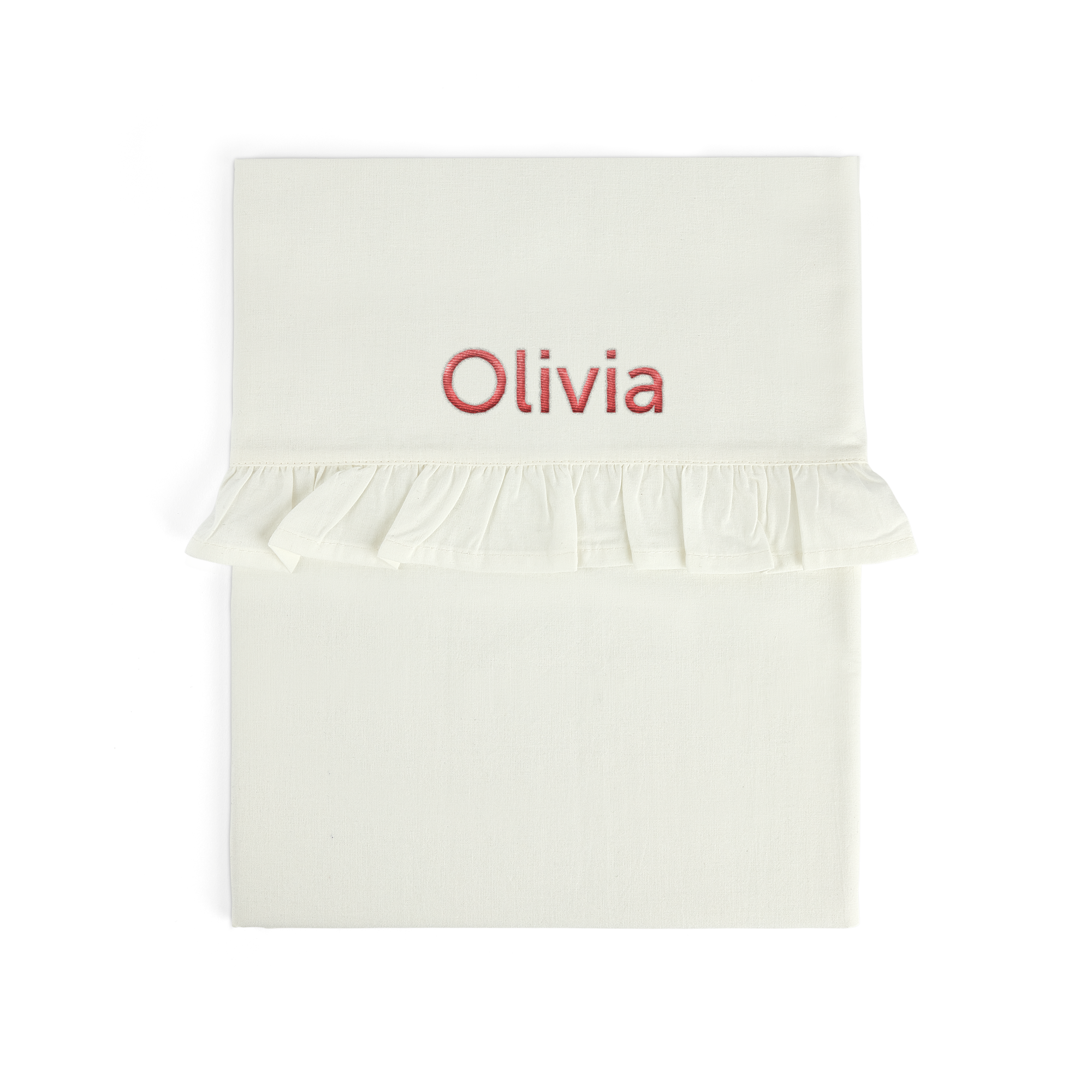 Personalized embroidered cot sheet with the name Olivia in red and a ruffle edge