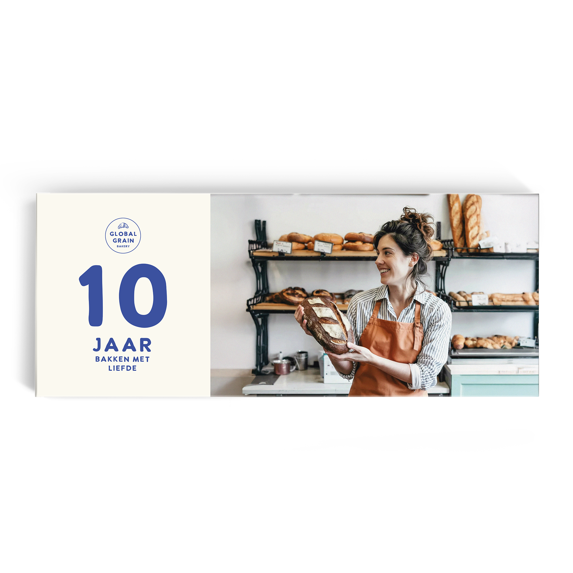 Mega chocolade reep bedrukken - Ritter Sport - 8 repen, met foto van een vrouw die brood bakt, tekst 10 JAAR BAKKEN MET LIEFDE.