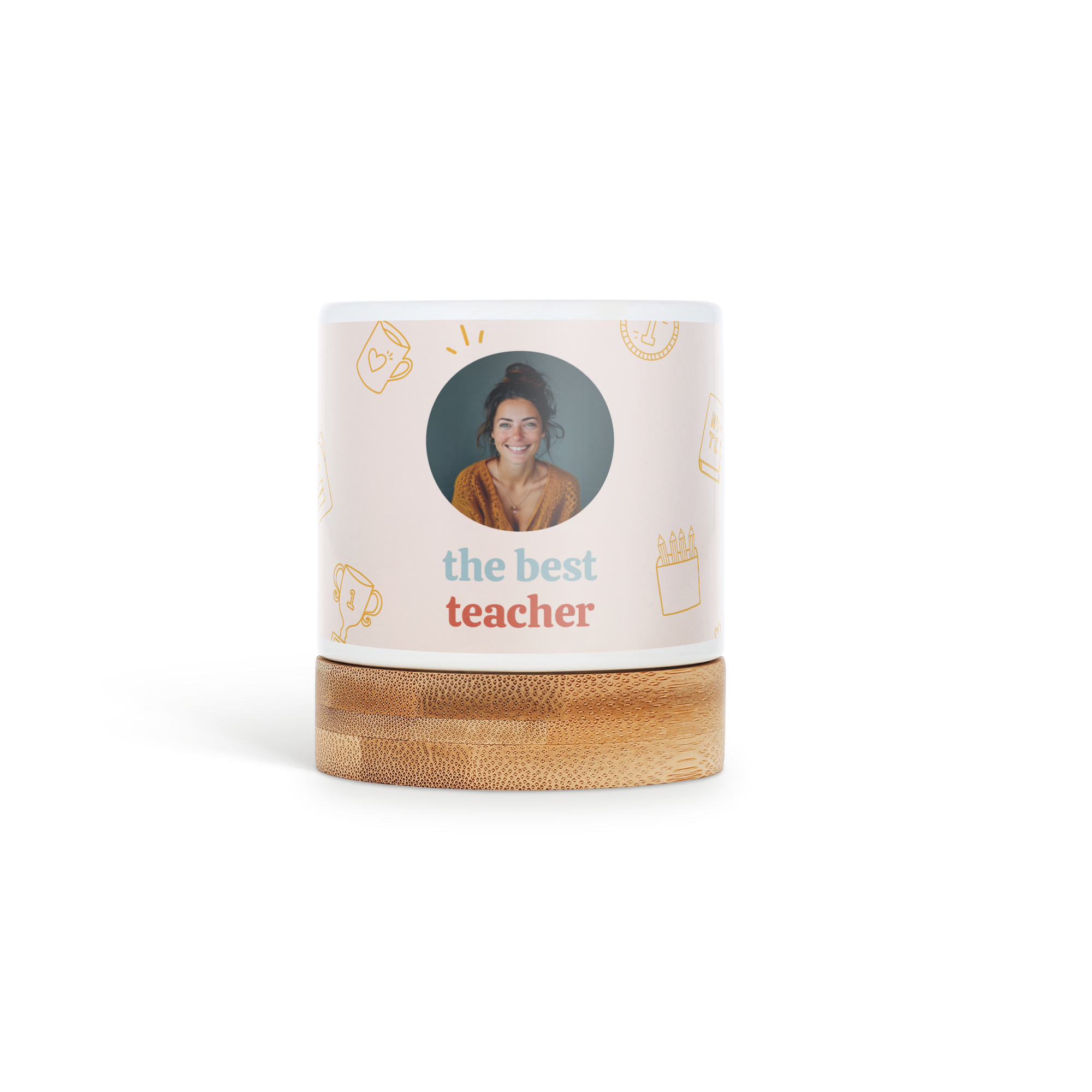 Personalized flower pot with a photo and the text the best teacher on a bamboo coaster, giving greenery a personal touch