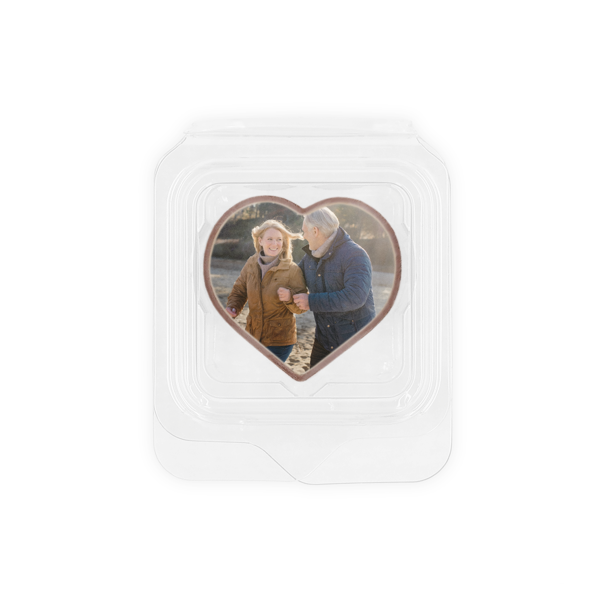 25 Fotopralinen einzeln verpackt als Gastgeschenk, bedruckt mit einem Foto eines lächelnden Paares im Herzrahmen