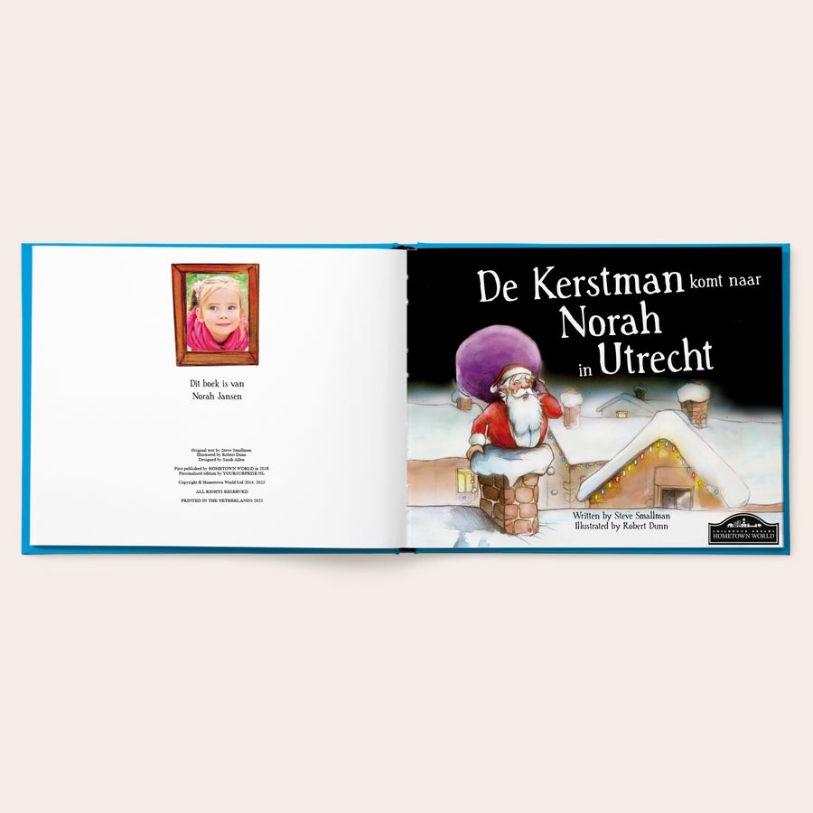 Gepersonaliseerd kerstboek "De kerstman komt" Boek met naam en foto - De kerstman komt - Hardcover, gepersonaliseerd met naam Norah Jansen en een foto.