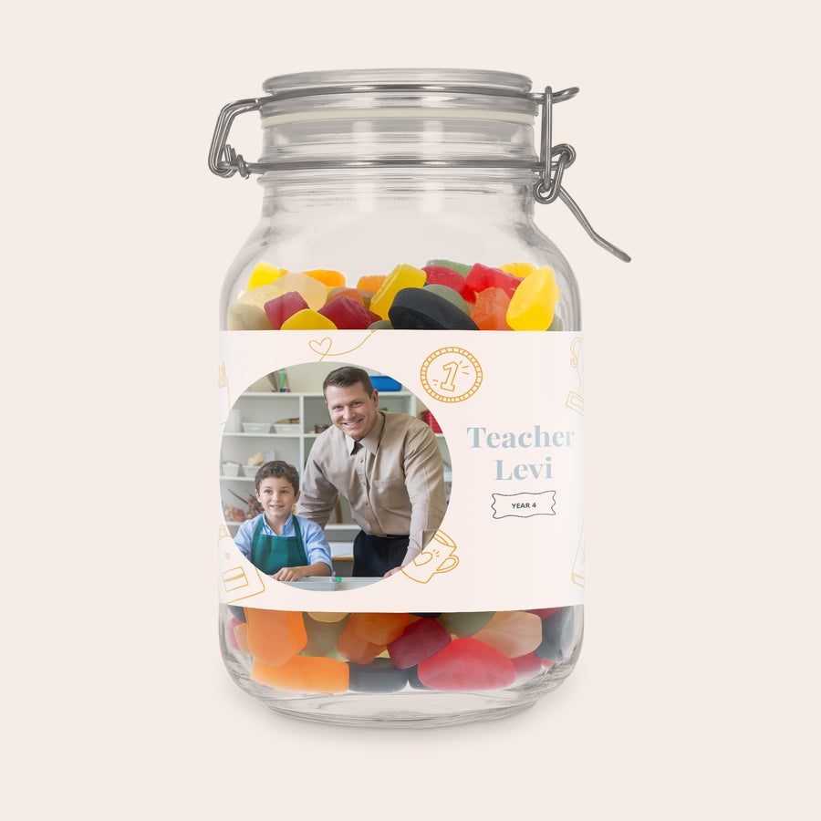 Personalised sweet jar Personalised sweet jar with winegums, printed with a photo of a teacher and student and the text Teacher Levi Year 4