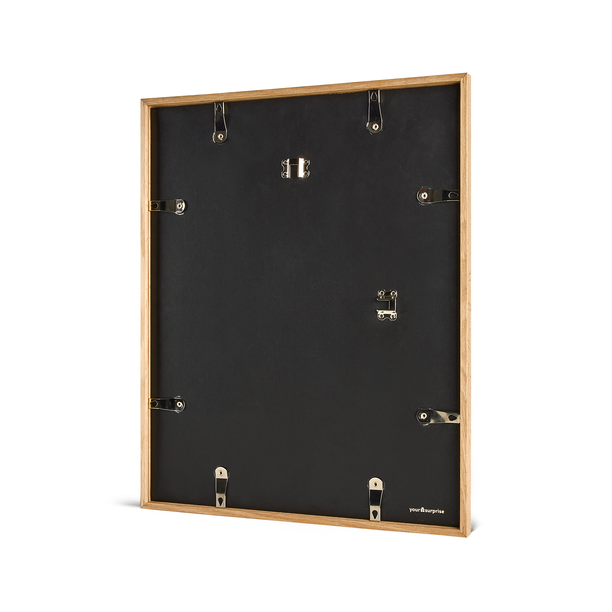 Back of a personalized photo print with a light wooden frame, featuring hooks for hanging.