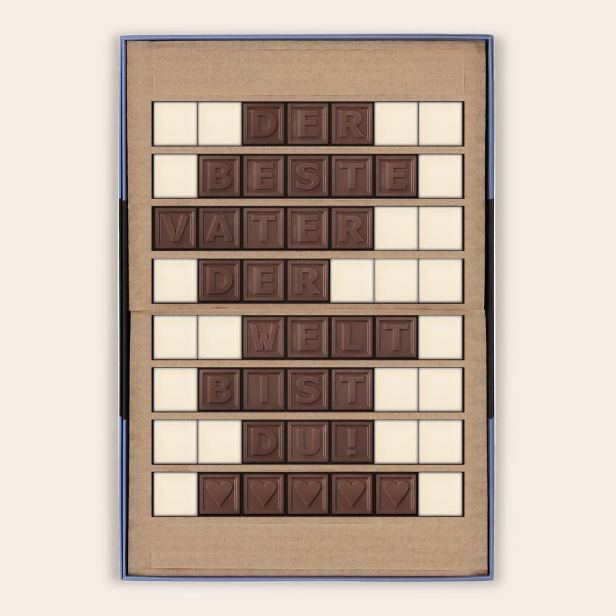 Schokotelegramm Selber Gestalten Chocotelegramm mit der Aufschrift "Der beste Vater der Welt bist du!" aus Milch- und weißer Schokolade als persönliche Nachricht