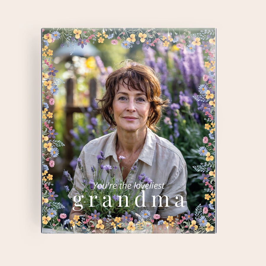 Personalised Pukka tea Personalised tea box with a photo of a woman, framed by colorful flowers and printed with "You're the loveliest grandma" for their personal tea sanctuary awaits.