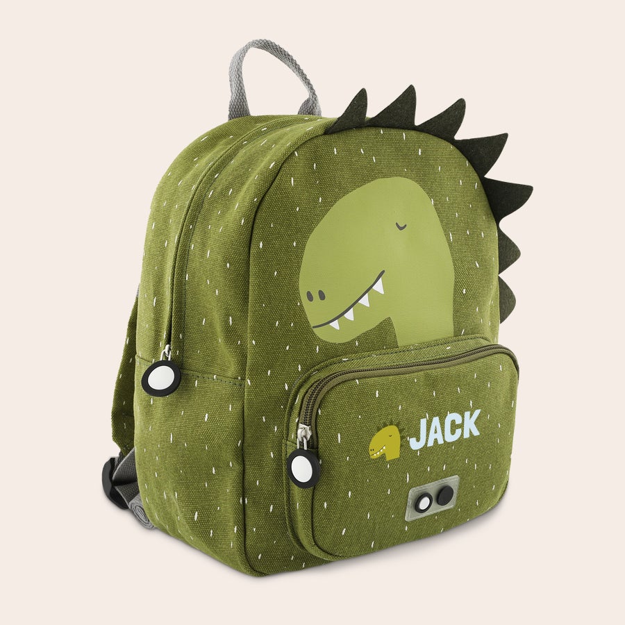 Zaino per Bambini Personalizzato - Trixie Zaino per bambini verde militare con dinosauro, personalizzato con il nome Jack stampato in azzurro sul davanti.