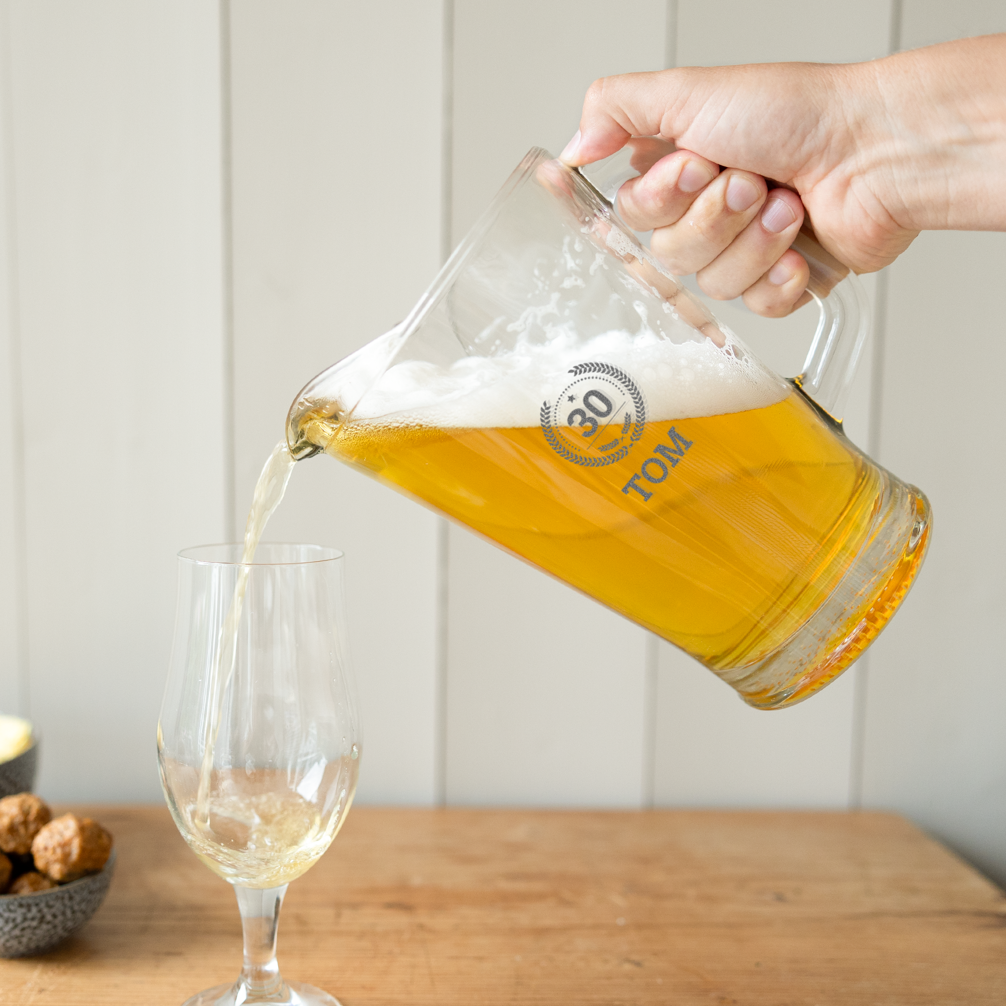 Engraved glass pitcher