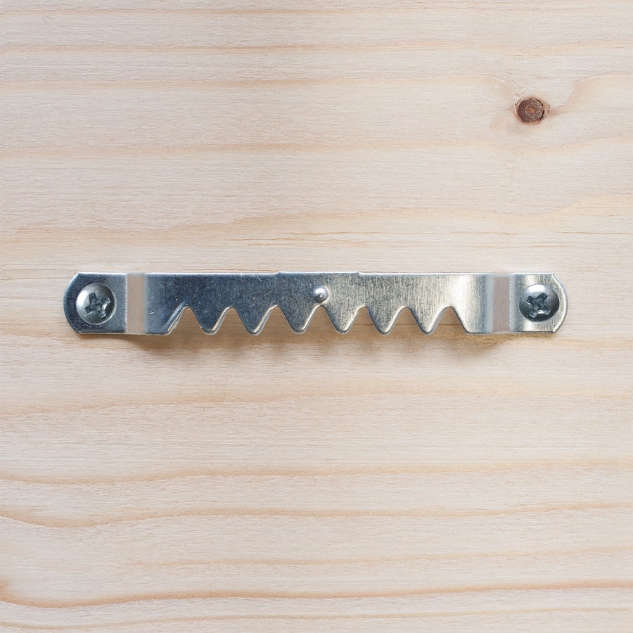 Photo on wood Photo of wooden planks showing a sawtooth hanger bracket for wall mounting
