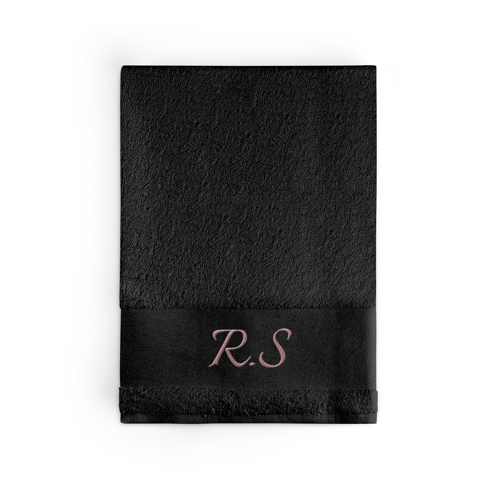 Serviette noire brodée d'initiales roses RS pour rendre chaque moment du bain unique
