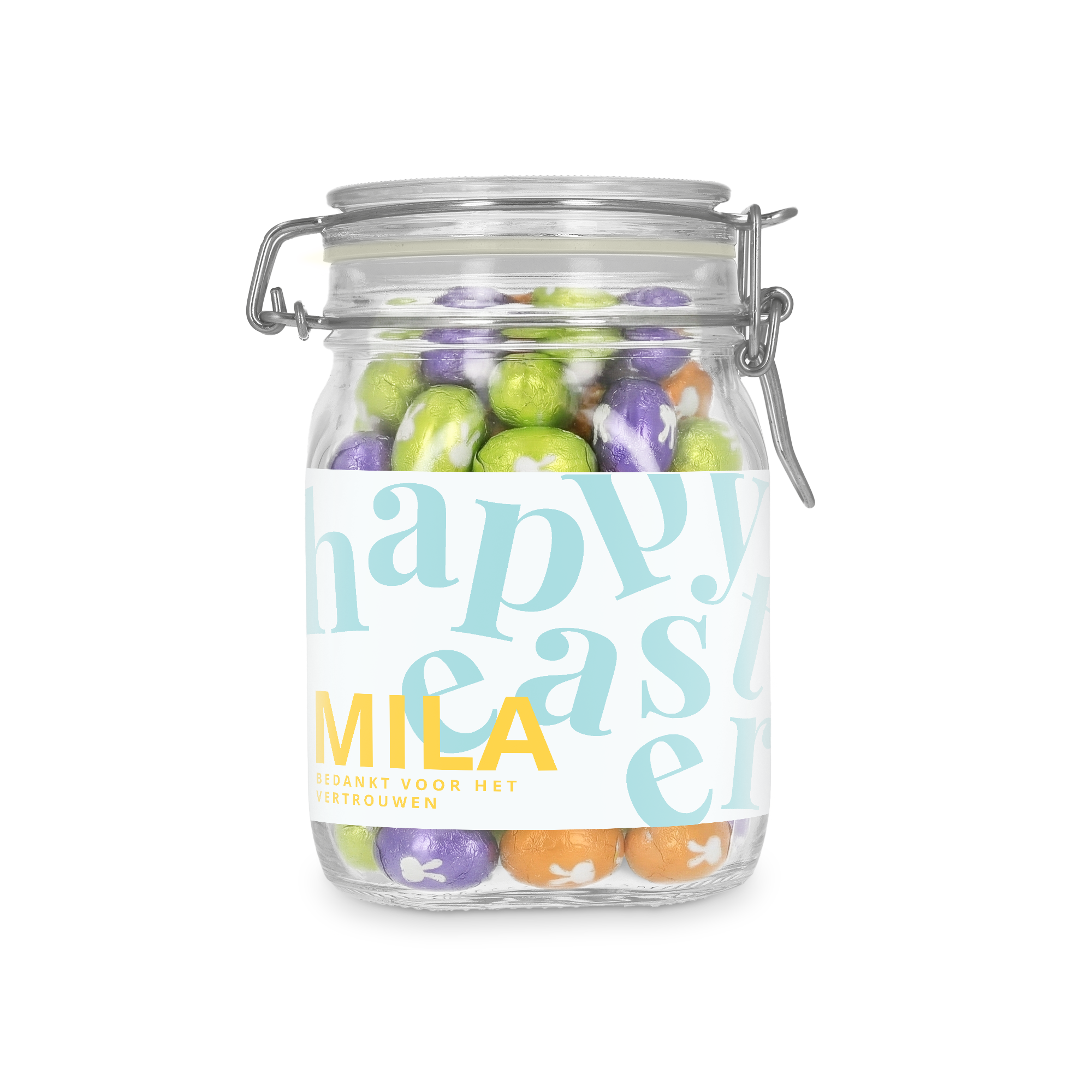 Chocolade paaseitjes in gepersonaliseerde pot - 1l met pastelkleurige eitjes en een etiket bedrukt met 'Happy Easter', naam Mila en een persoonlijke boodschap.