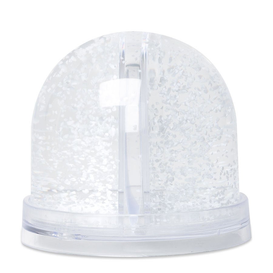 Glob de zăpadă personalizat transparent, cu particule albe și suport interior pentru fotografie.