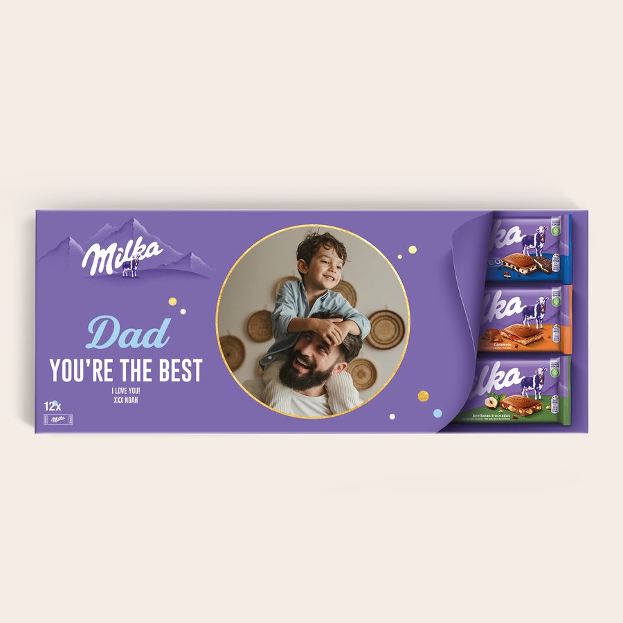 Personalizowana Mega Milka Ta tabliczka czekolady Milka w rozmiarze XXL z personalizowanym zdjęciem i napisem "Dad you're the best, I love you! XXX Noah".