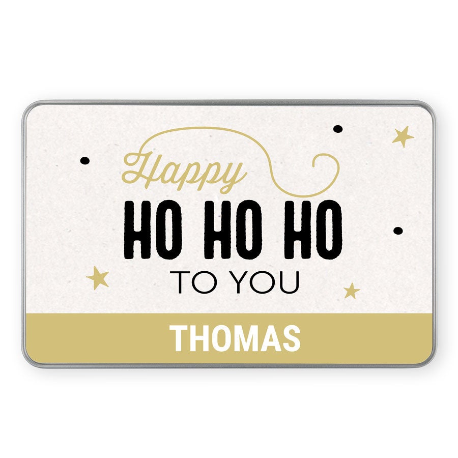 Ainutlaatuinen joulumuistojen säilytyslaatikko jossa teksti "Happy Ho Ho Ho To You" ja nimi "THOMAS" tulostettuna.