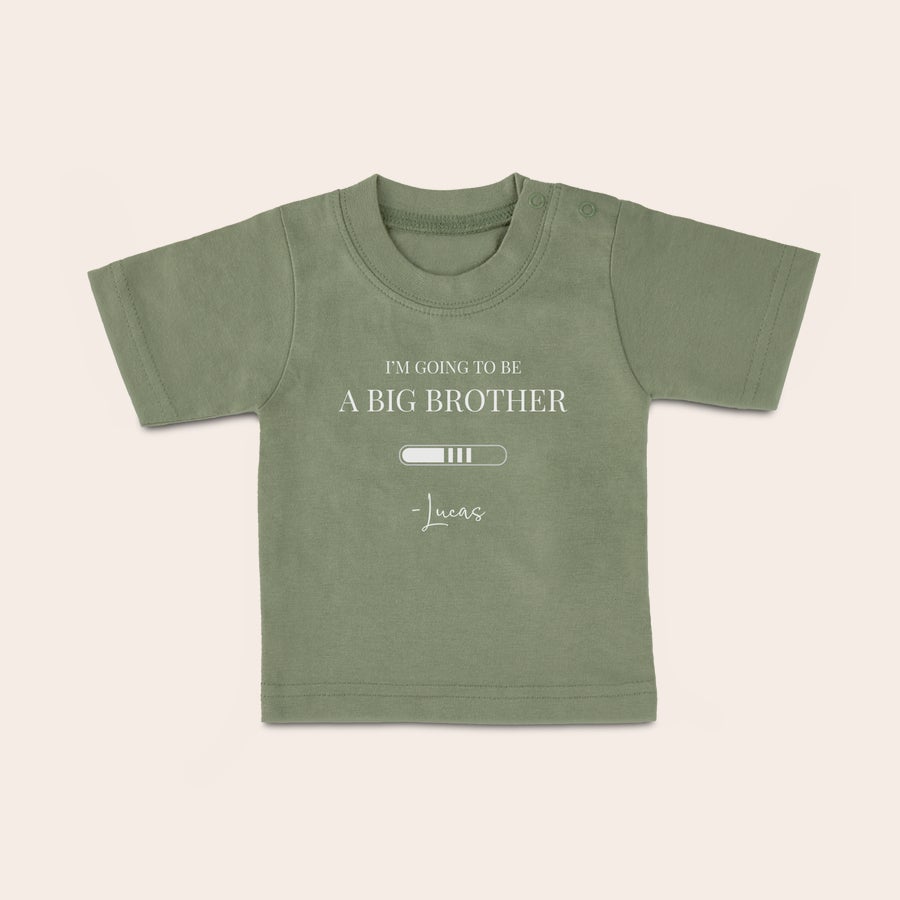 Personalised baby t shirt Green baby shirt with "I'm going to be a big brother" text and personalized with the name Lucas