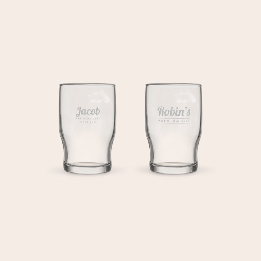 Personalised water glass Two personalized water glasses, one engraved with Jacob and the other with Robins, for a custom water glass