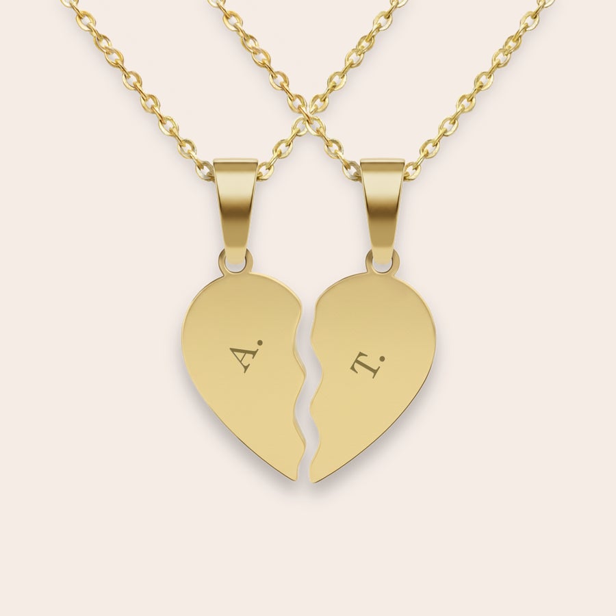 Collana con cuore spezzato inciso Collana con cuore spezzato inciso