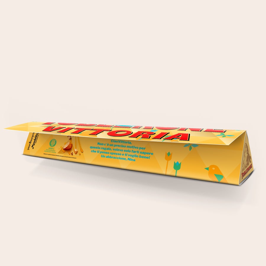 Toblerone Personalizzato - Pasqua Un delizioso Toblerone personalizzato con design pasquale, nome Vittoria e messaggio stampati