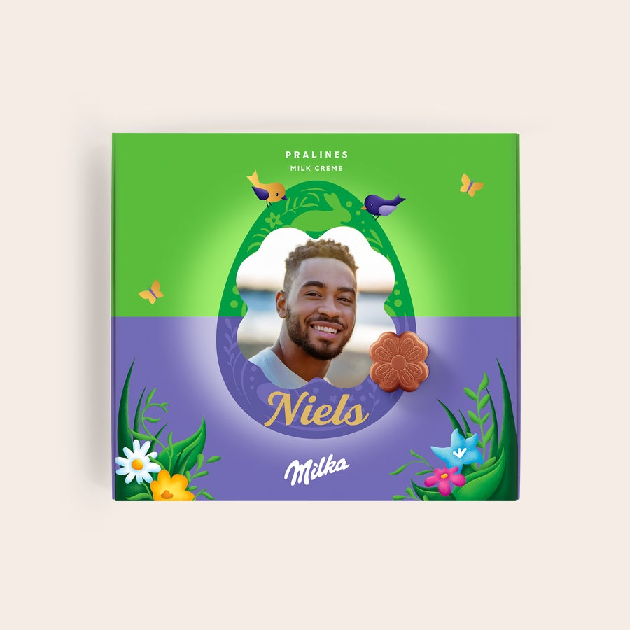 Milka Praliné Húsvét Virágok Személyre szabott Say it with Milka csokoládés díszdoboz saját fotóval, "Niels" névvel és virág alakú pralinéval.