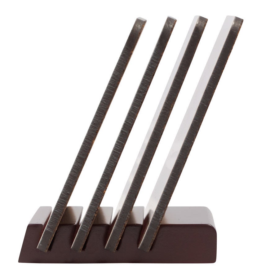 Coasters Side view of four personalized hardboard coasters with a glossy finish in a dark wood stand