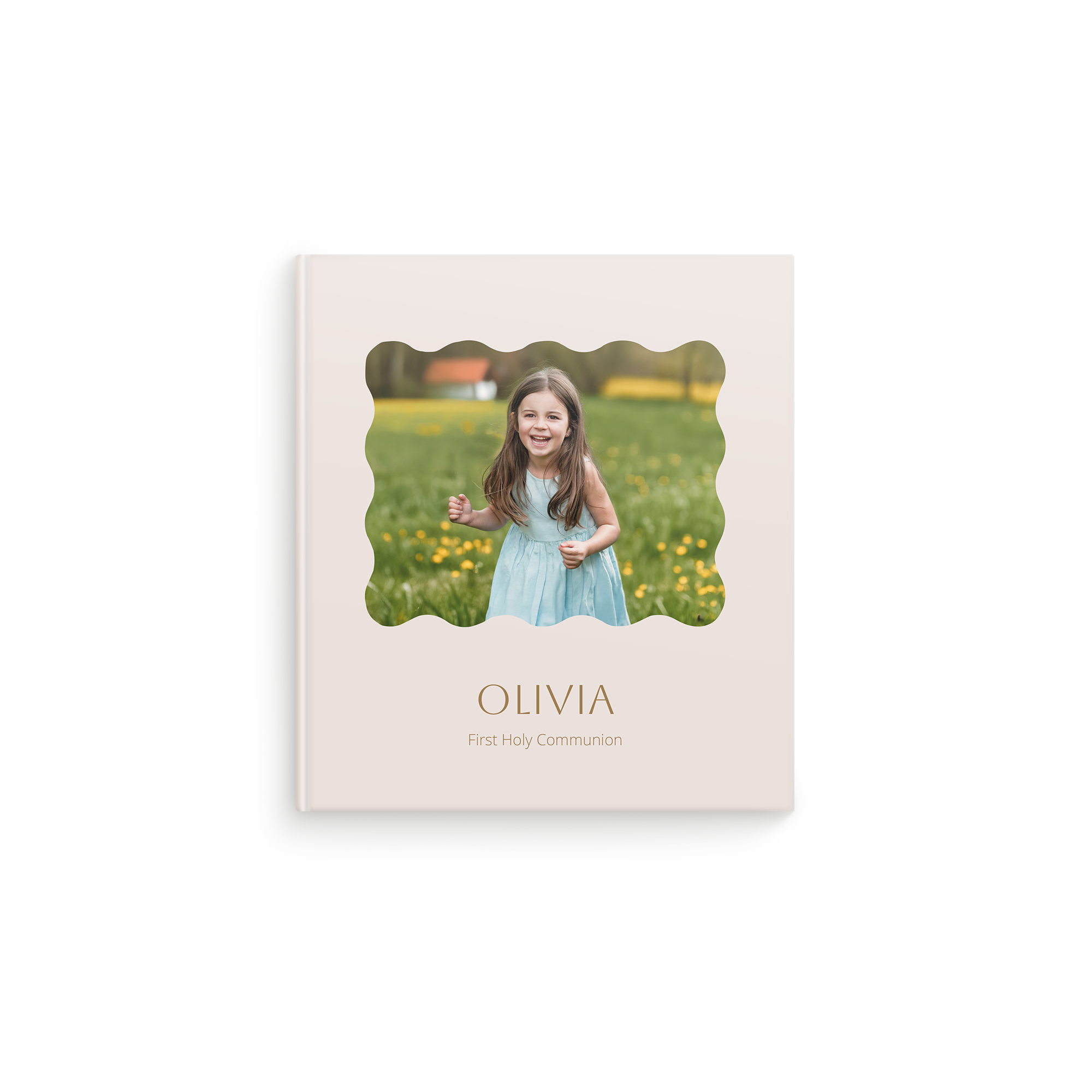Personoitu valokuvakirja 'Olivia First Holy Communion' -tekstillä.