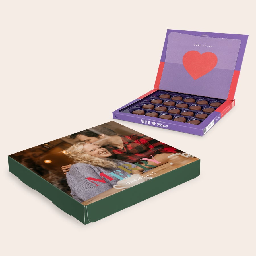 Pralinés de Milka Navidad Caja de regalo Milka personalizada con una foto de pareja feliz y texto "Merry Christmas" impreso, llena de bombones.