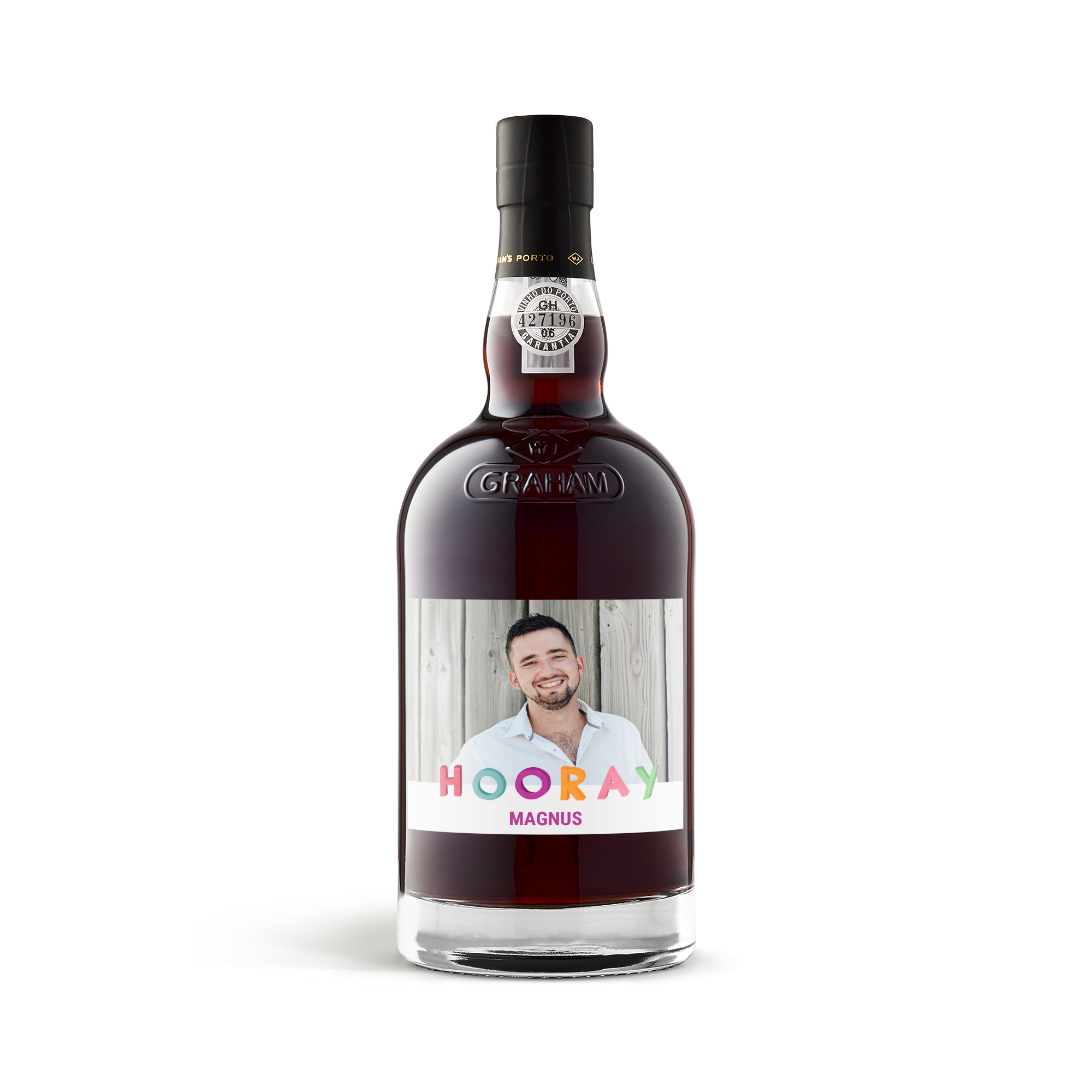 Grahams 10 års kaskade modnet portvin med personligt billedmærke, "Hooray Magnus" og foto af en smilende mand
