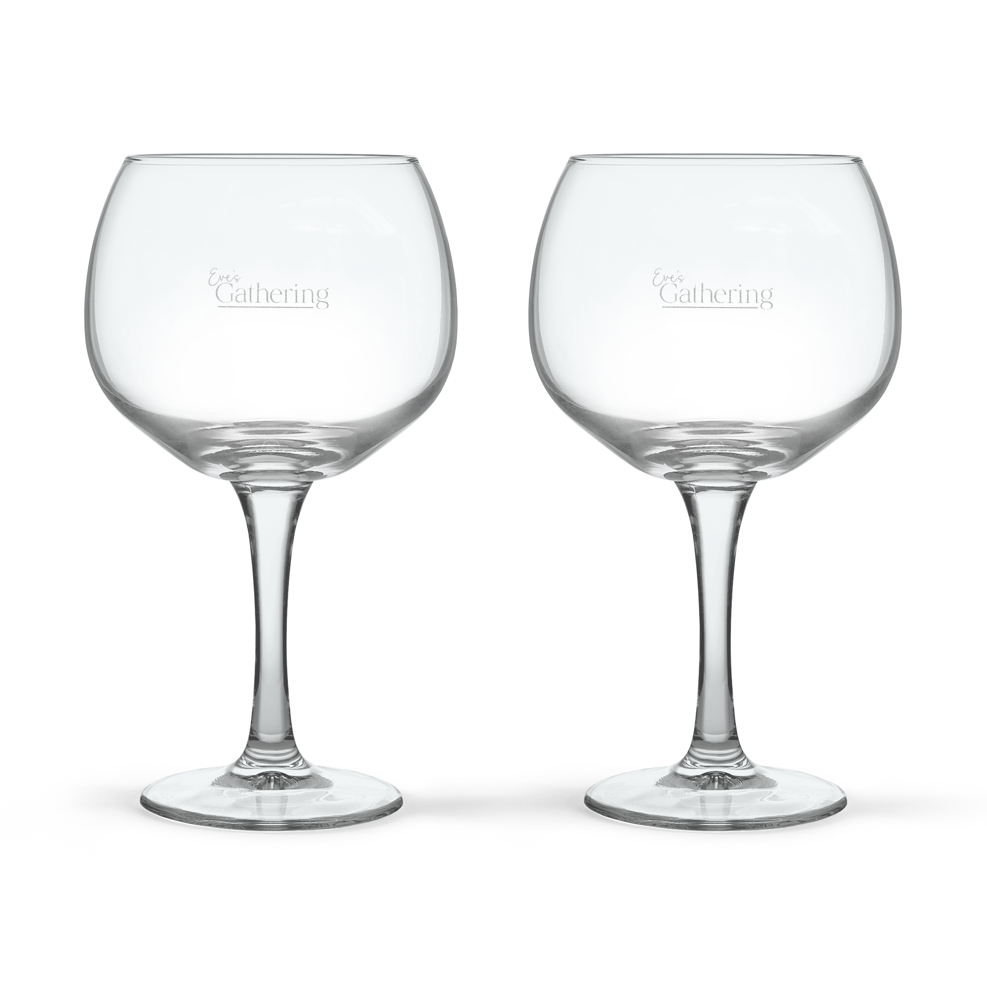 Deux verres à gin personnalisés, gravés au laser avec le texte Eve's Gathering, pour une dégustation unique.