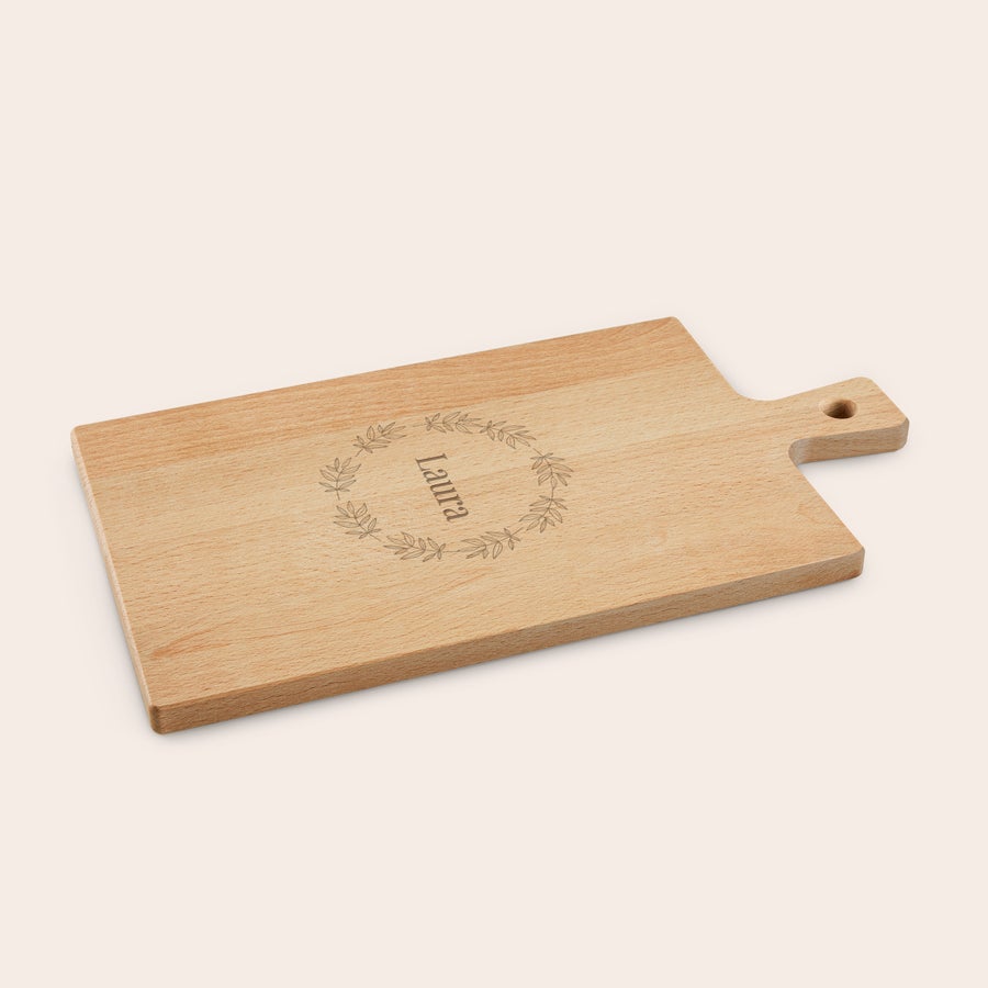 Borrelpakket met gegraveerde houten serveerplank Borrelpakket met gegraveerde houten serveerplank