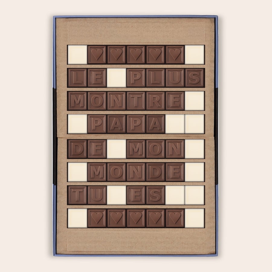 Messages en chocolat - Chocotelegram Chocotelegram personnalisé "LE PLUS BEAU PAPA DU MONDE TU ES" avec des cœurs et des espaces en chocolat blanc
