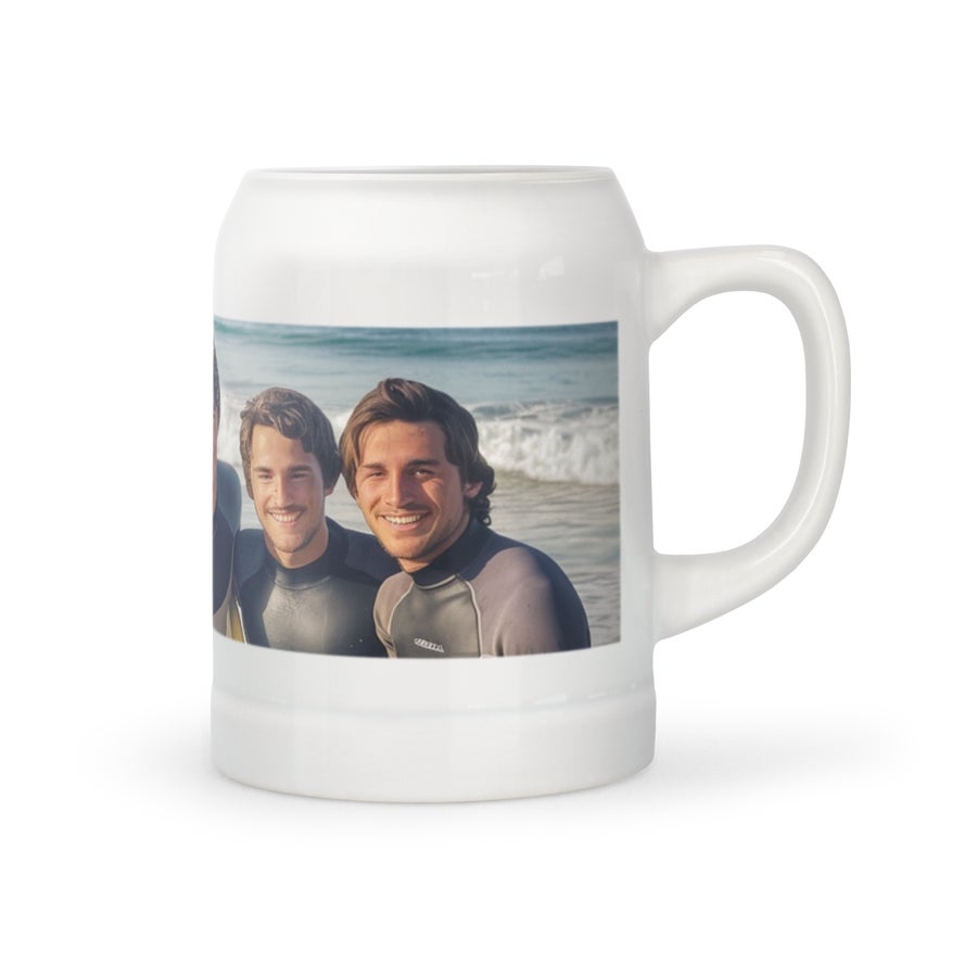 Beer mug Ceramic personalized beer mug printed with a photo of two men in wetsuits on a beach, waves in the background.