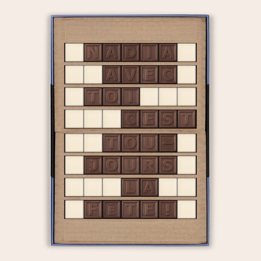 Messages en chocolat - Chocotelegram Chocotelegram personnalisé NADIA AVEC TOI C EST TOUJOURS LA FETE en chocolat au lait et blanc