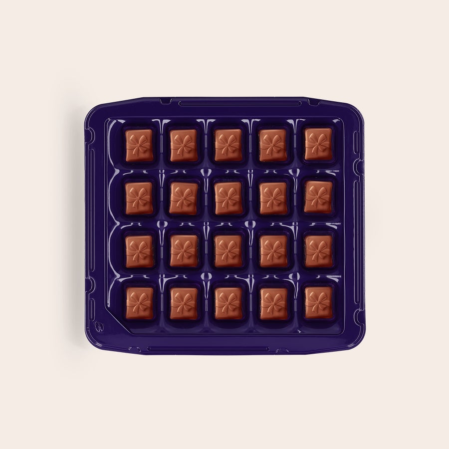 Milka Pralinky Narodeniny Krabička Milka čokoládových bonbónov s darčekovým motívom na oslavu narodenín