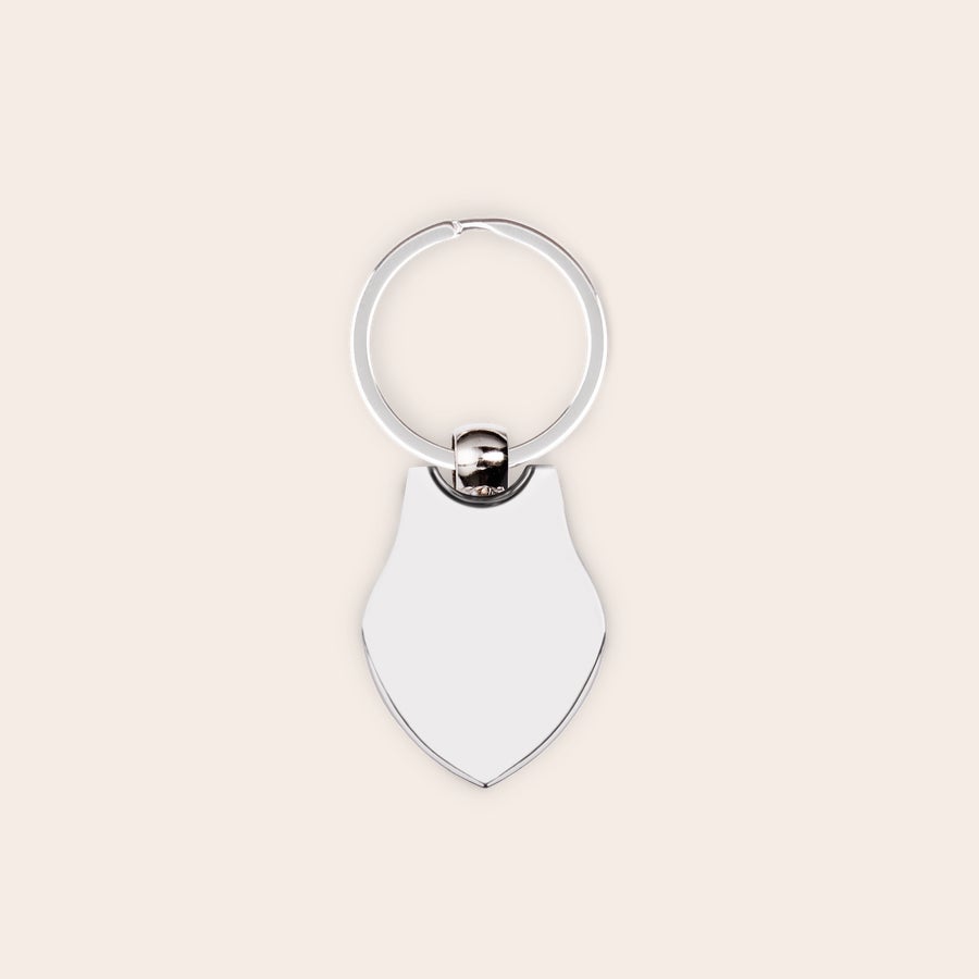 Personalised key ring - Stainless steel Silver shield-shaped keyring with a photo printed on the front, ready for personalization.