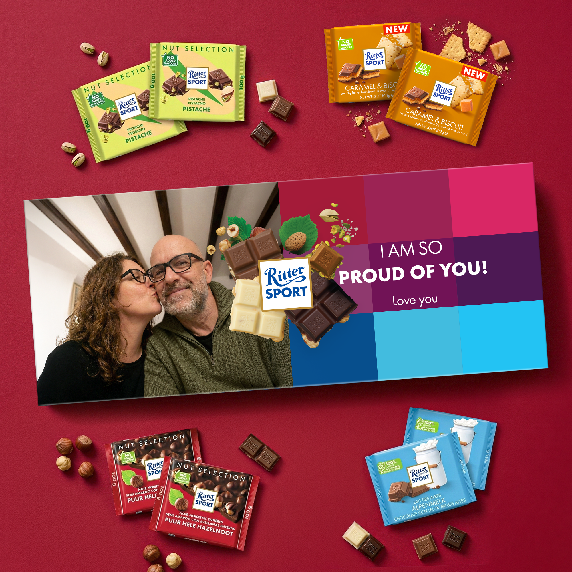 A Personalised XXL Ritter Sport chocolate bar - 8 bars, featuring a photo of a couple and custom text "I AM SO PROUD OF YOU! Love you" printed on the box lid.