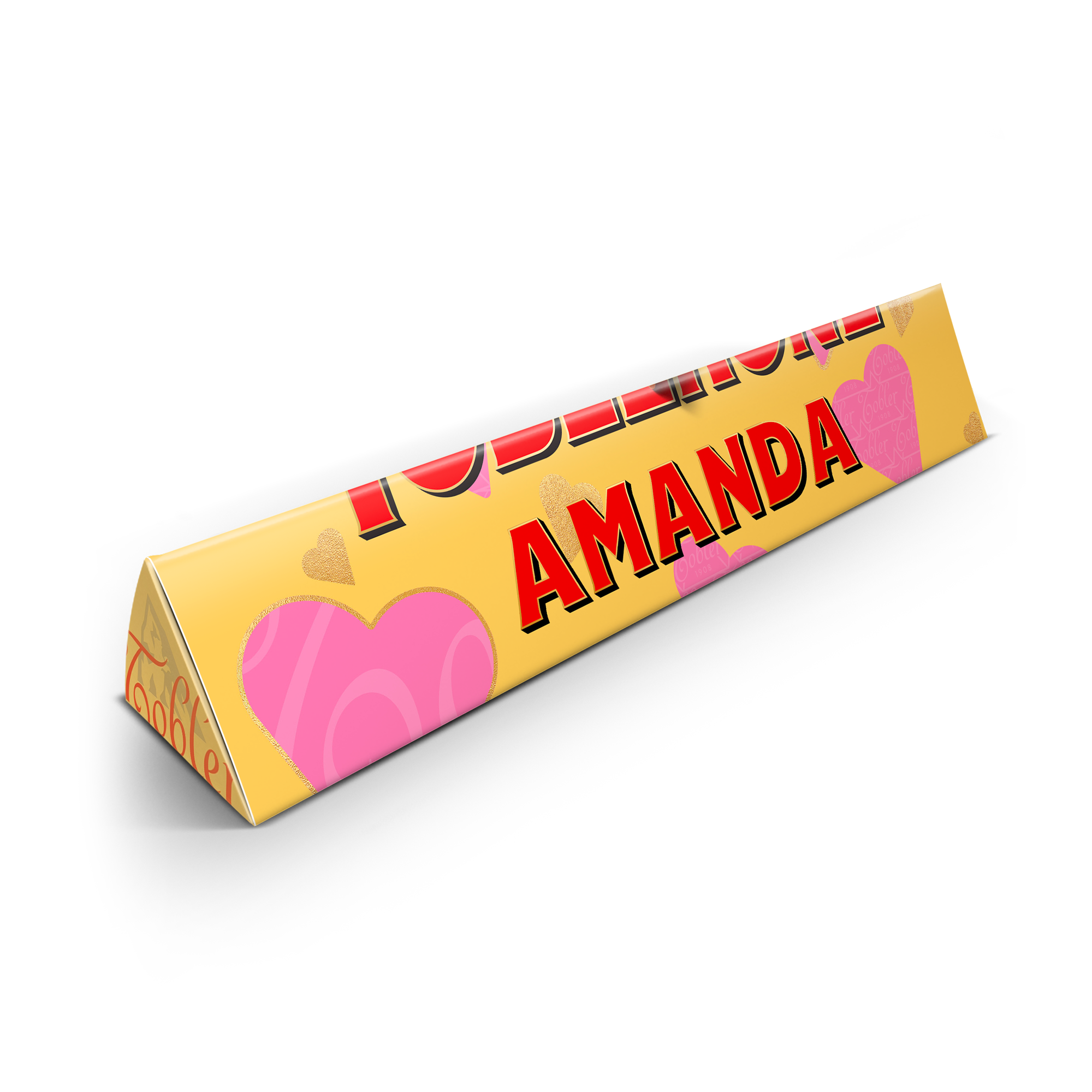 En personaliserad Toblerone med namn "AMANDA" tryckt i rött på guldfärgad förpackning med hjärtan.