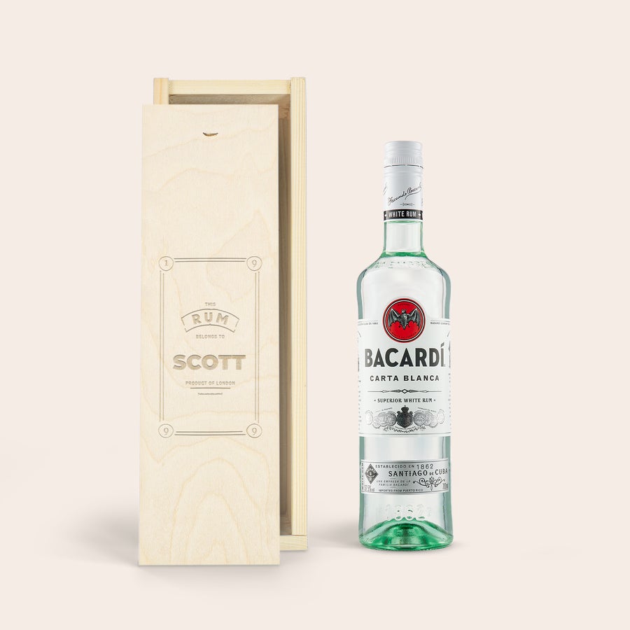 Personalised Rum Gift - Bacardi White A bottle of Bacardi white rum next to an engraved wooden case featuring the name Scott and custom text.