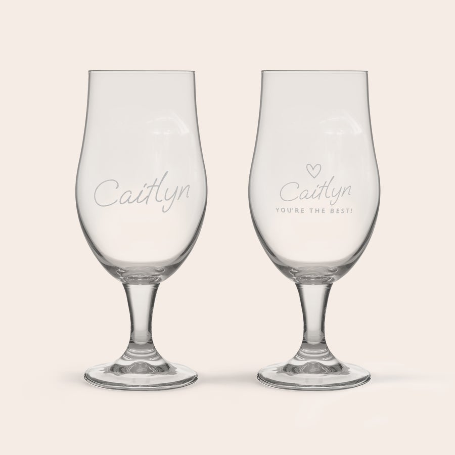 Personalised home beer brewing kit including glasses Two beer glasses engraved with the name Caitlyn and a personalized message for a home beer brewing set.