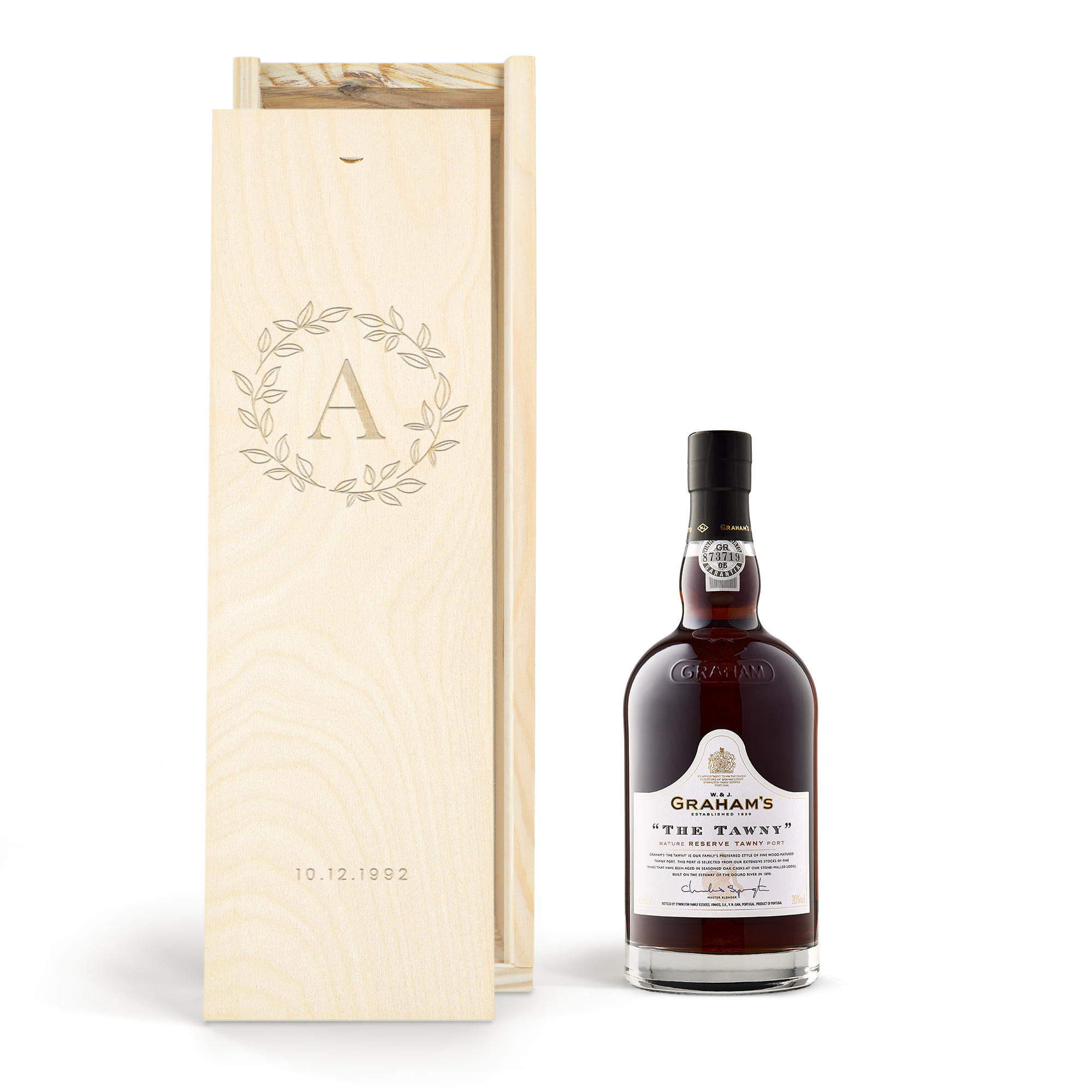 Graham's The Tawny Reserve port in an engraved wooden case featuring a laurel wreath, initial A, and date 10.12.1992