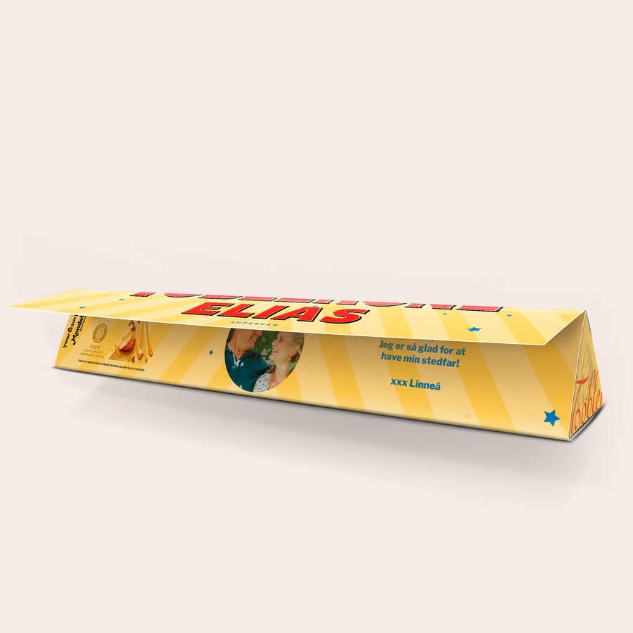 Personliga Toblerone - Farsdag Personlig Toblerone 200g med tryckt omslag, foto och texten "SUPERFAR ELIAS" samt "Jeg er så glad for at have min stedfar! xxx Linneá".