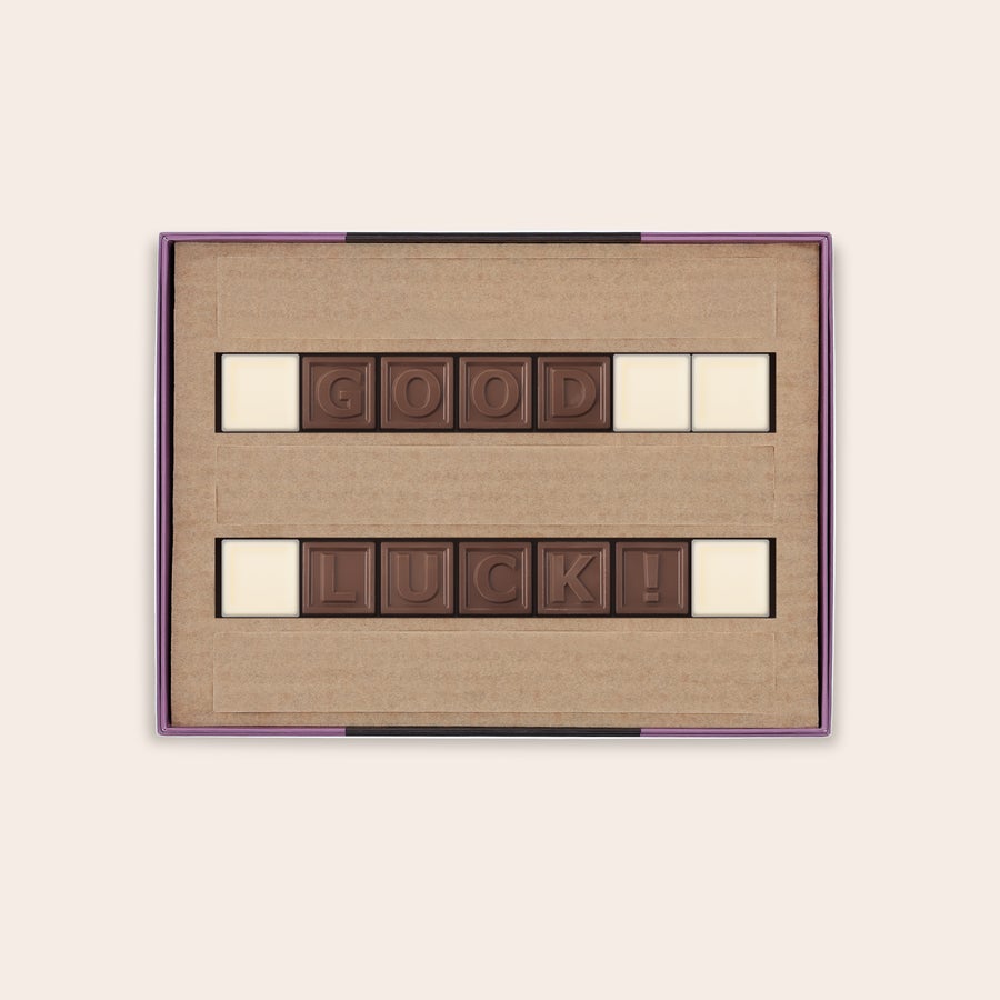 Chocotelegram® Pudełko z personalizowaną czekoladą mleczną z białymi spacjami z napisem Good Luck!