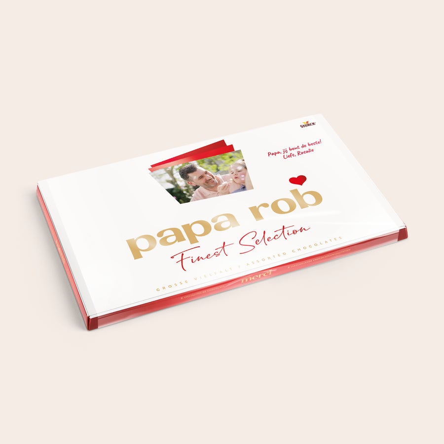 merci Finest Selection met kaart Merci Finest Selection chocolade mix met gepersonaliseerde kaart - 400 gram. De kaart is bedrukt met de naam Papa Rob en een persoonlijke foto van een lachende man en kind, plus de tekst