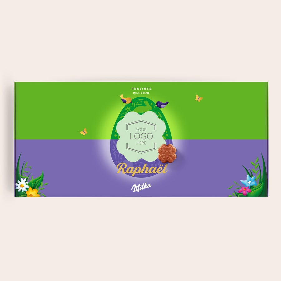Milka personnalisé - Pâques Coffret cadeau personnalisé Milka de Pâques imprimé avec le texte "Your logo here" et le nom Raphaël