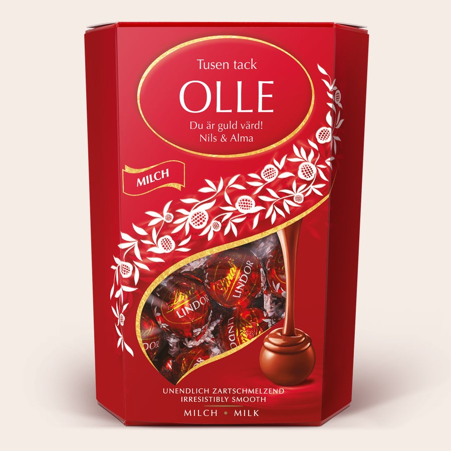 Lindt choklad presentförpackning Röd personlig Lindt chokladask med namnet Olle, texten TUSEN TACK och Du är guld värd! tryckt i vitt, med namnen Nils & Alma. Denna Lindt chokladask är den perfekta presenten till alla chokladälskare.