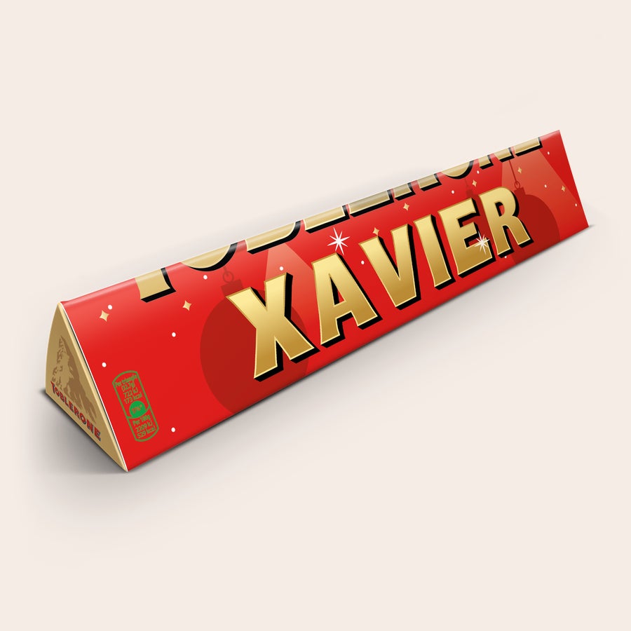 Toblerone personnalisé - Noël Barre de chocolat Toblerone Noël personnalisée avec le prénom Xavier imprimé et des décorations festives