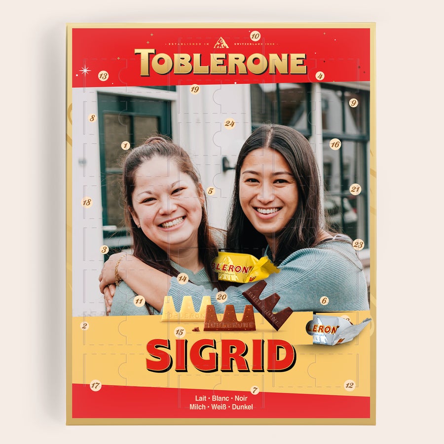 Adventskalender med bilde - Toblerone 2025 Personlig Toblerone adventskalender trykt med bilde av to kvinner og navnet Sigrid. Tell ned til jul.