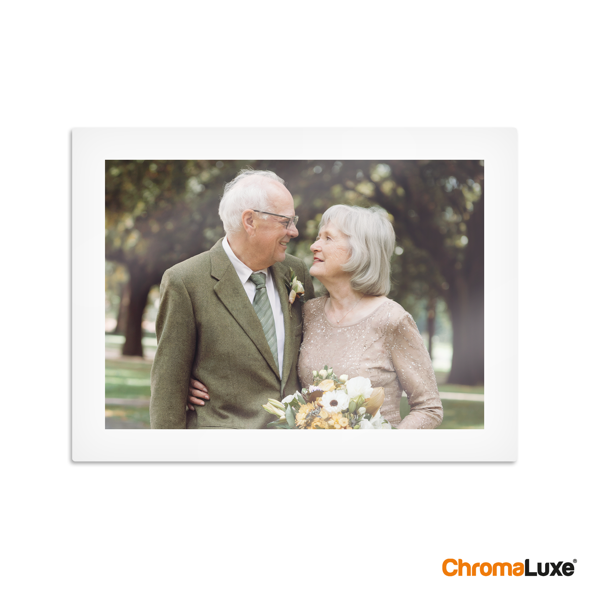 Chromaluxe aluminium photo print of an older couple embracing with a bouquet of flowers, featuring personalized memories