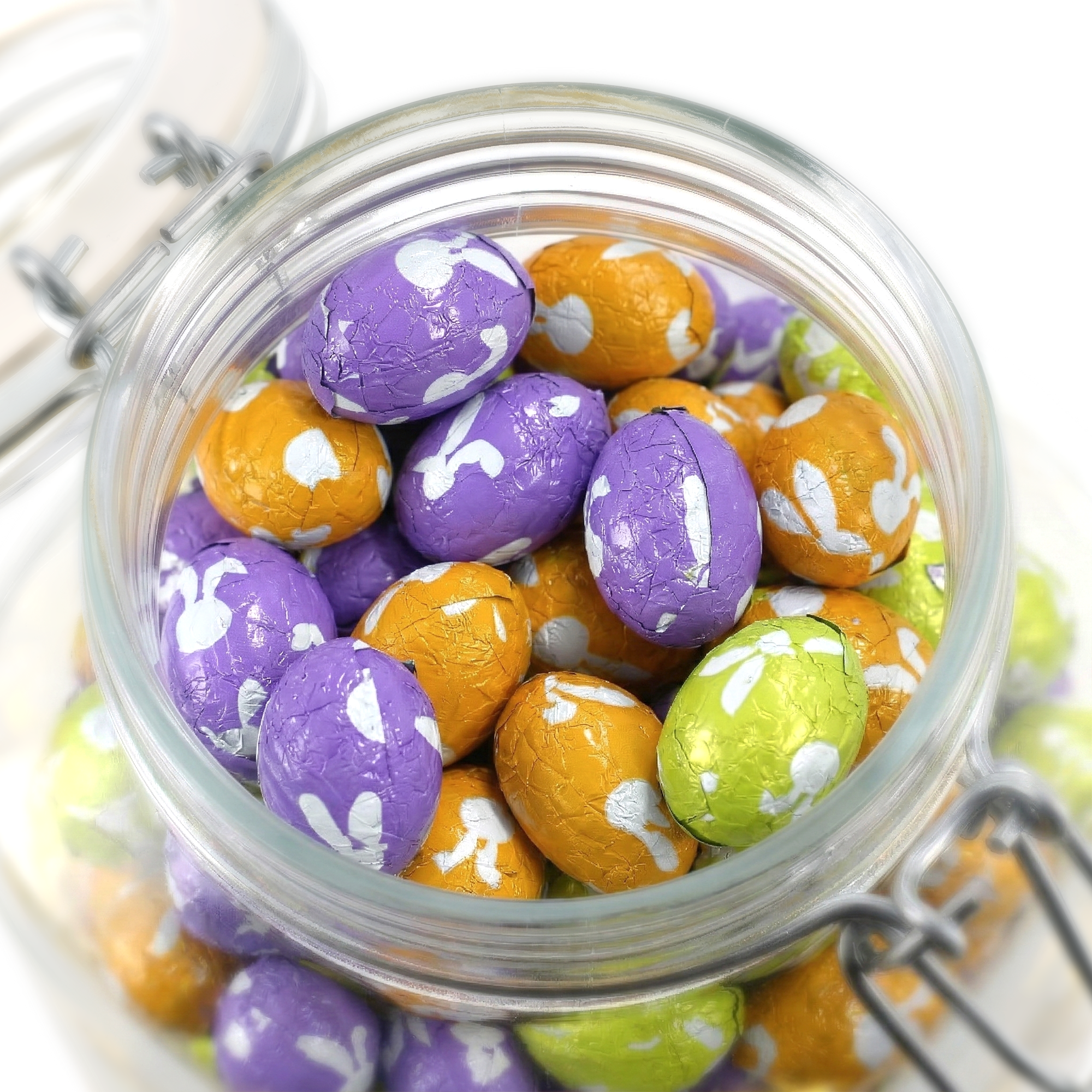 Personalised sweet jar - 2L - Chocolate eggs, glass jar filled with purple, orange, and green foil-wrapped chocolate eggs, custom design on lid